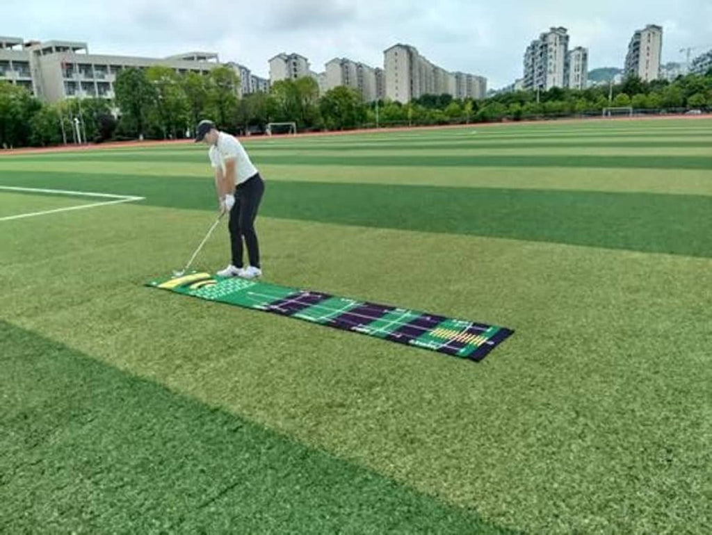 Green golf putting practice mat featuring alignment lines and numbered target spots