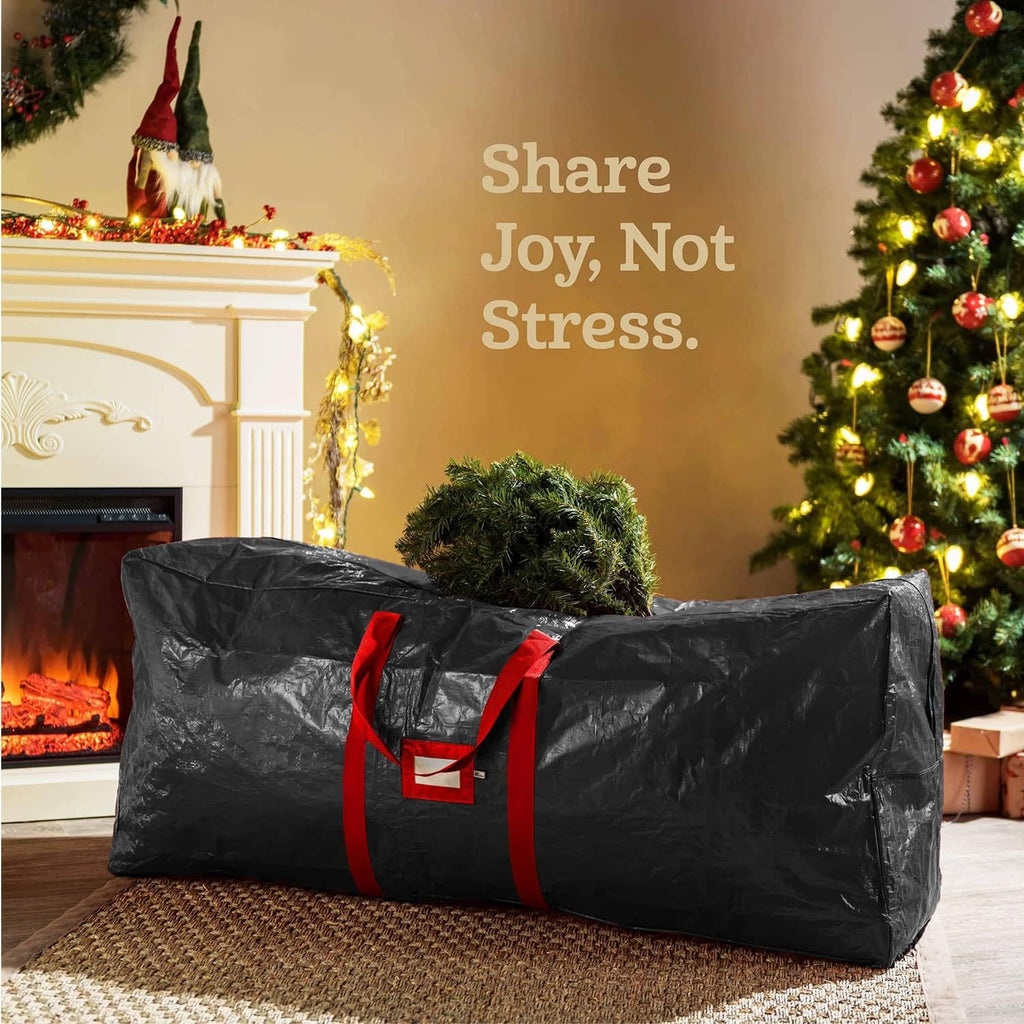 Large Christmas tree storage bag, black with red straps, folded open for storage