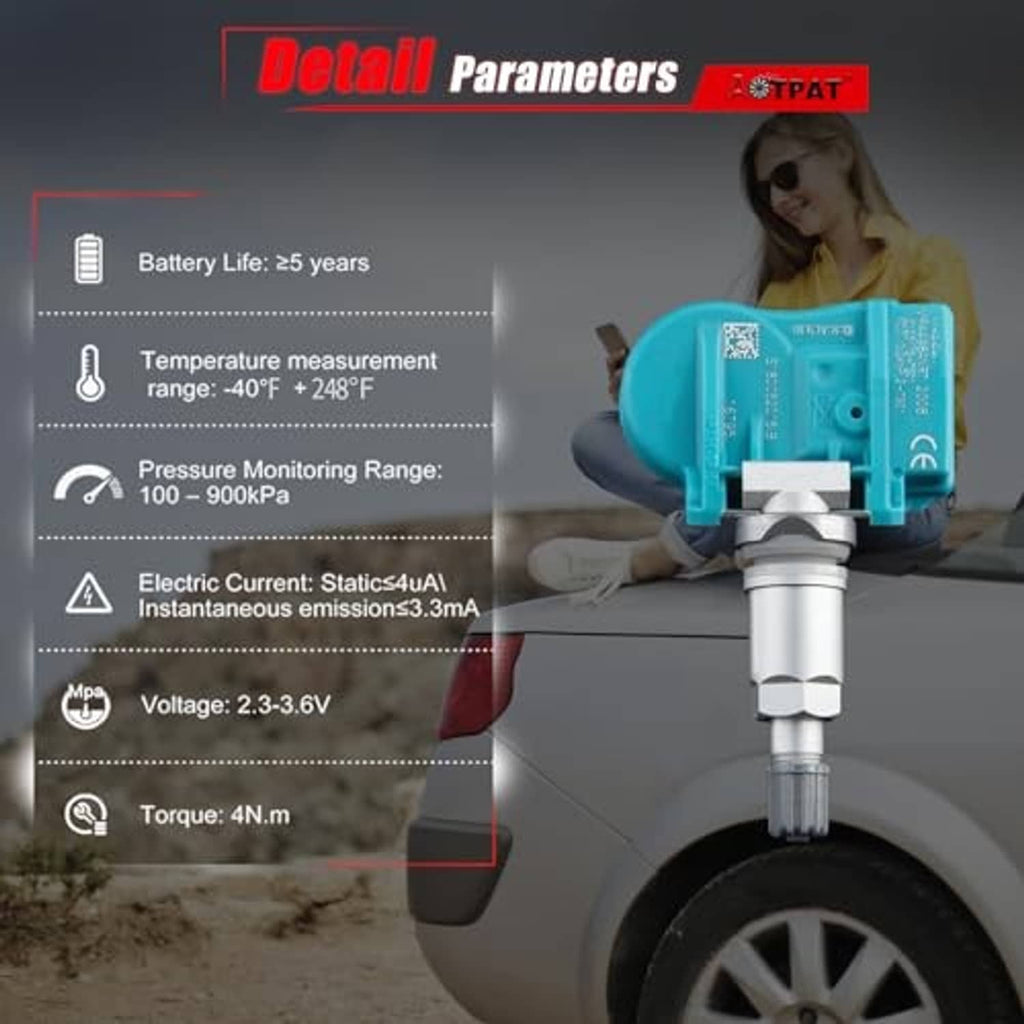 Turquoise TPMS sensor with metal valve stem beside a vehicle wheel