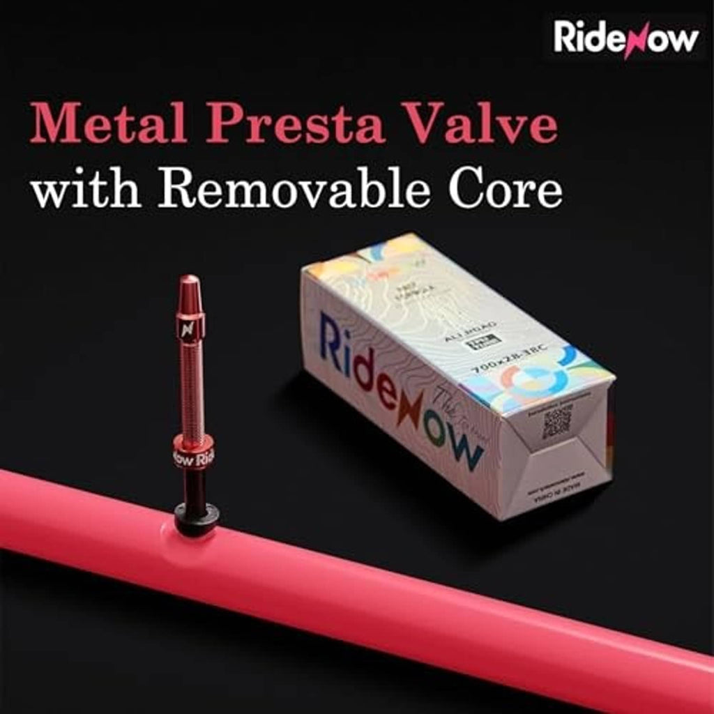 TPU inner tube with metal Presta valve and removable core, shown with red tube