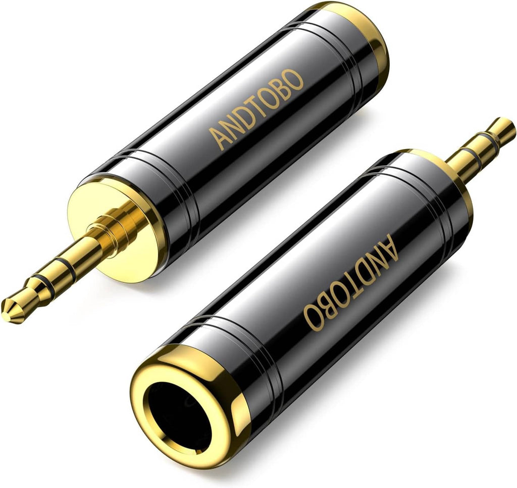 Stereo headphone adapter with black housing and gold 3.5 mm male plug and 1/4 in jack