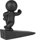 Black door stop figurine with outstretched hand on a long wedge base.