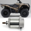 Starter motor with pinion gear shaft shown alongside an ATV