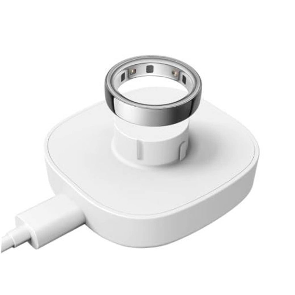 White ring charging dock with metal charging ring and attached USB-C cable