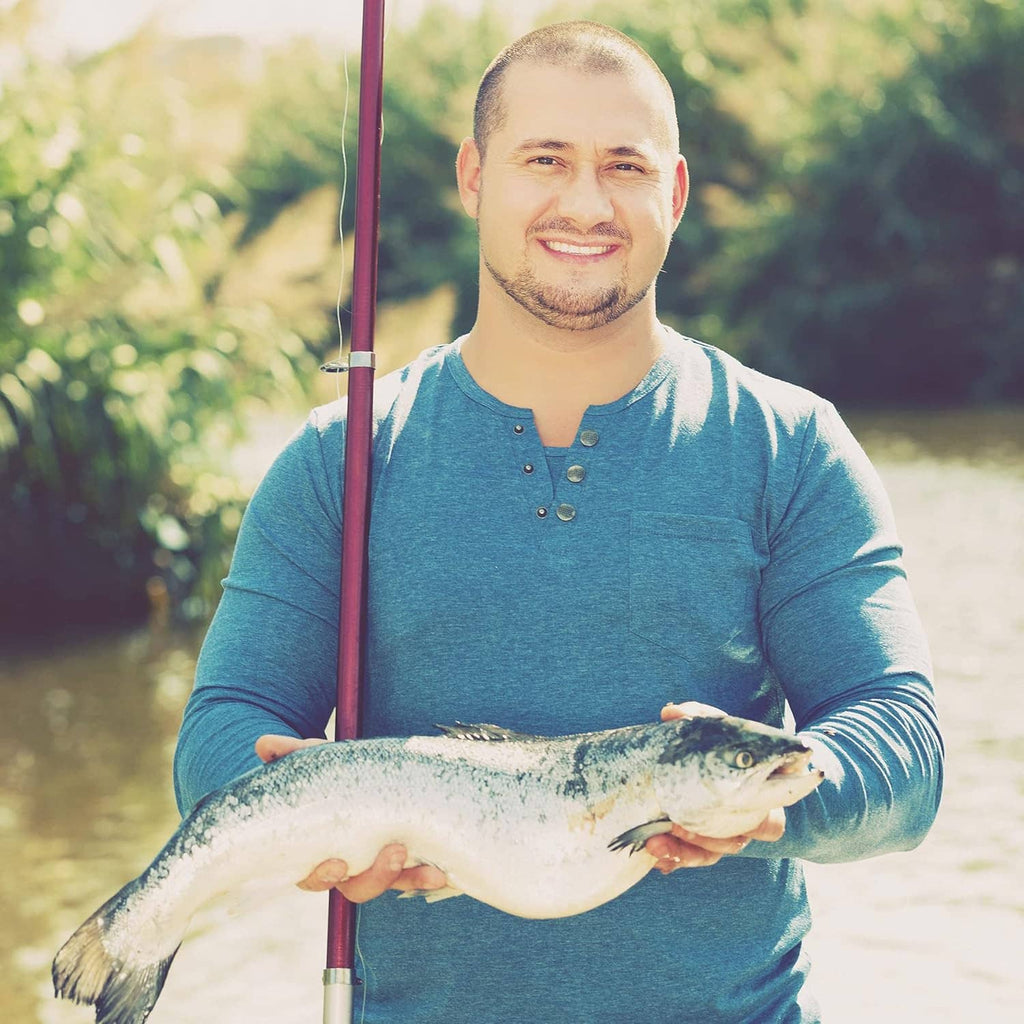Tool storage box not visible; person holding a fishing rod and catch
