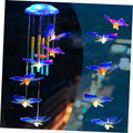 Blue solar wind chime with glowing butterfly ornaments and hanging light tubes