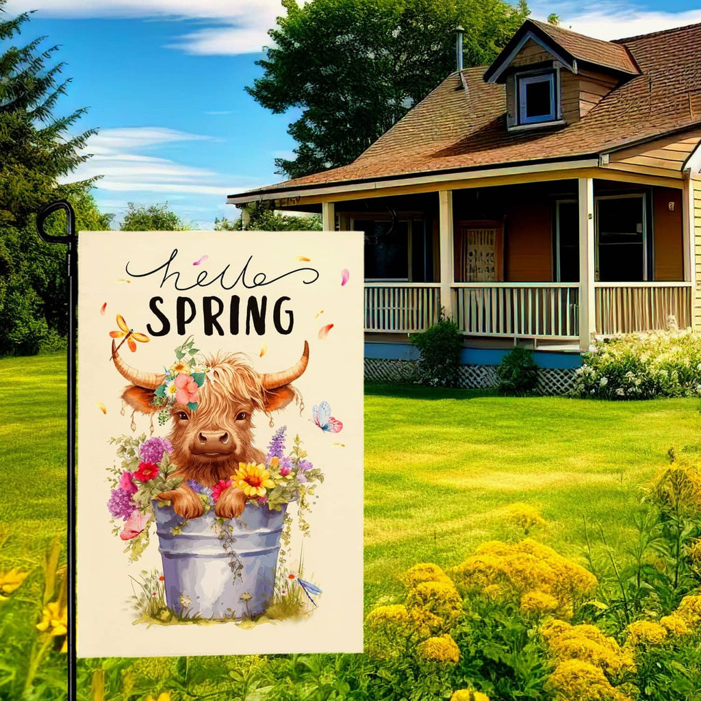Hello Spring garden flag showing a highland cow with flowers and butterflies on a cream background