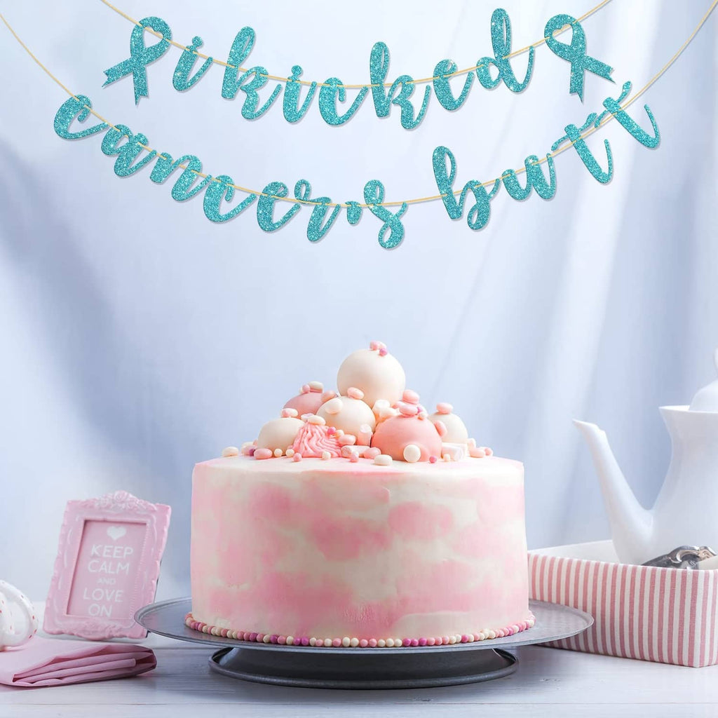 Sky blue glitter awareness banner with 'Kick cancer' script and golden cord ties