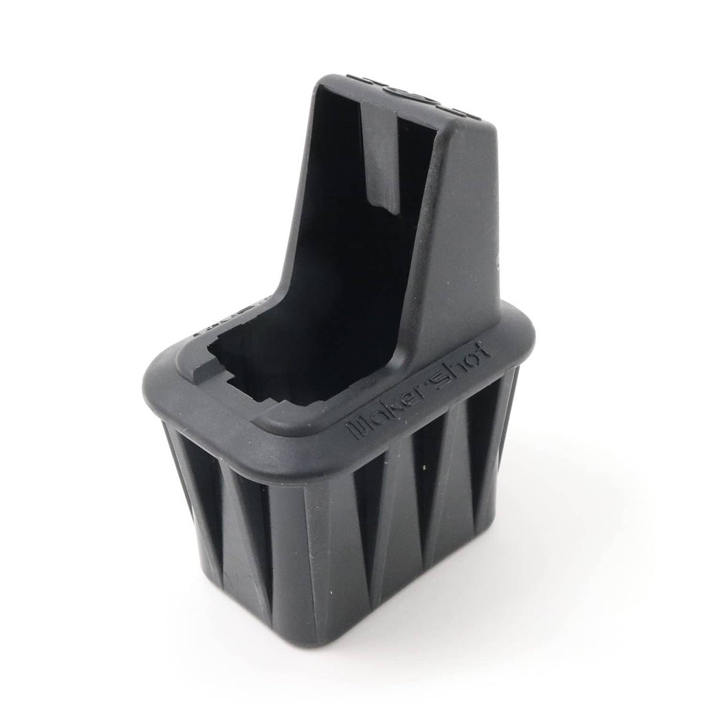 Black speed loader holder with open top loading slot for brass rounds