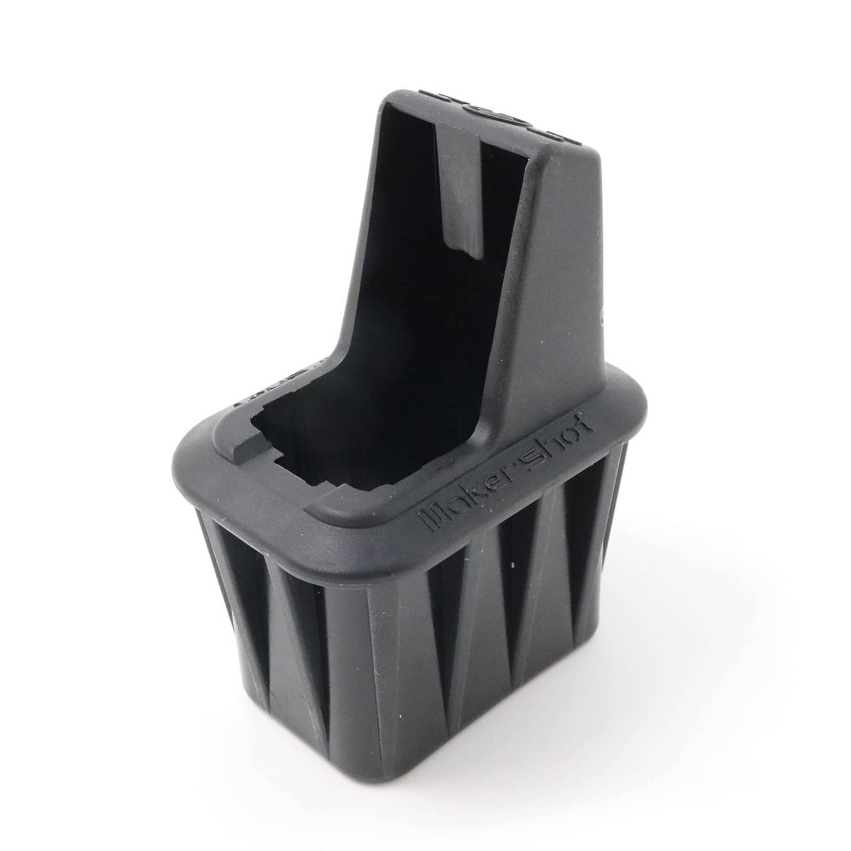 Black speed loader holder with open top loading slot for brass rounds