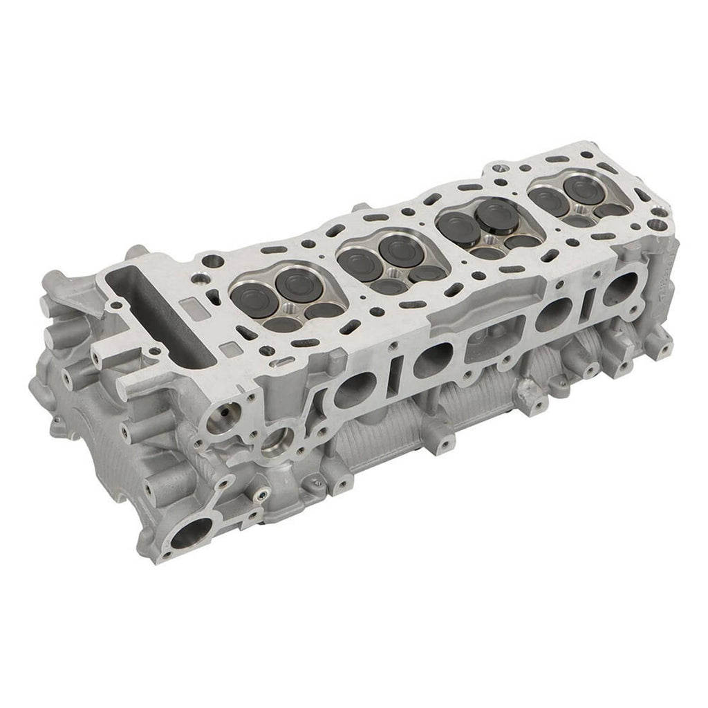 Cylinder head with camshaft area, valve bores, and exhaust port openings