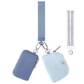 Mini dual pouch wristlet with two blue zip pouches and metal keyring straps
