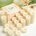 Cream beeswax tea light candles in metal cups, multiple wicks lit