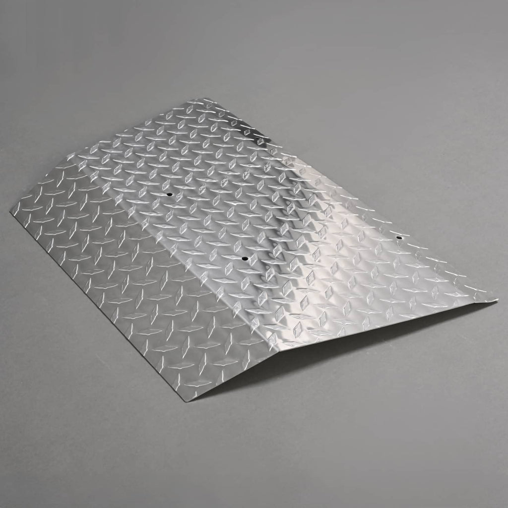 Aluminum diamond plate front shock bumper cover with raised texture and mounting holes