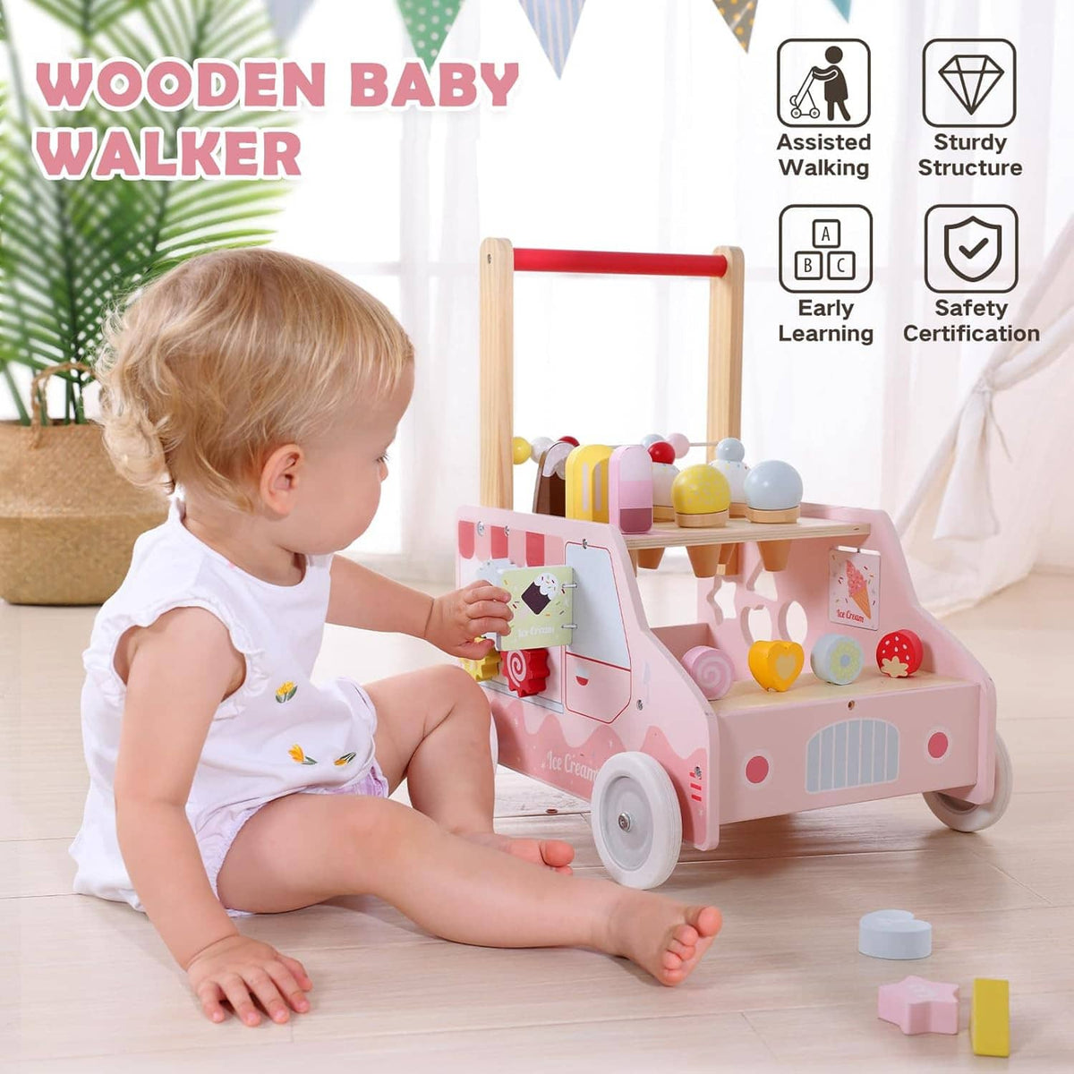 Baby pushing a pink wooden baby walker with red handle and bead play activity top