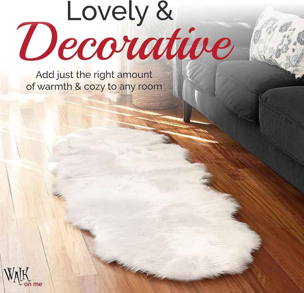 White faux fur rug runner on wood floor in front of a dark sofa