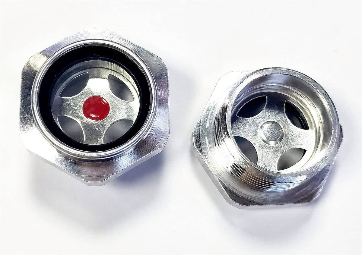 Two silver oil sight glasses with round black seals and red indicator discs