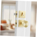 Satin brass entry door knob and deadbolt lock set on a white door.