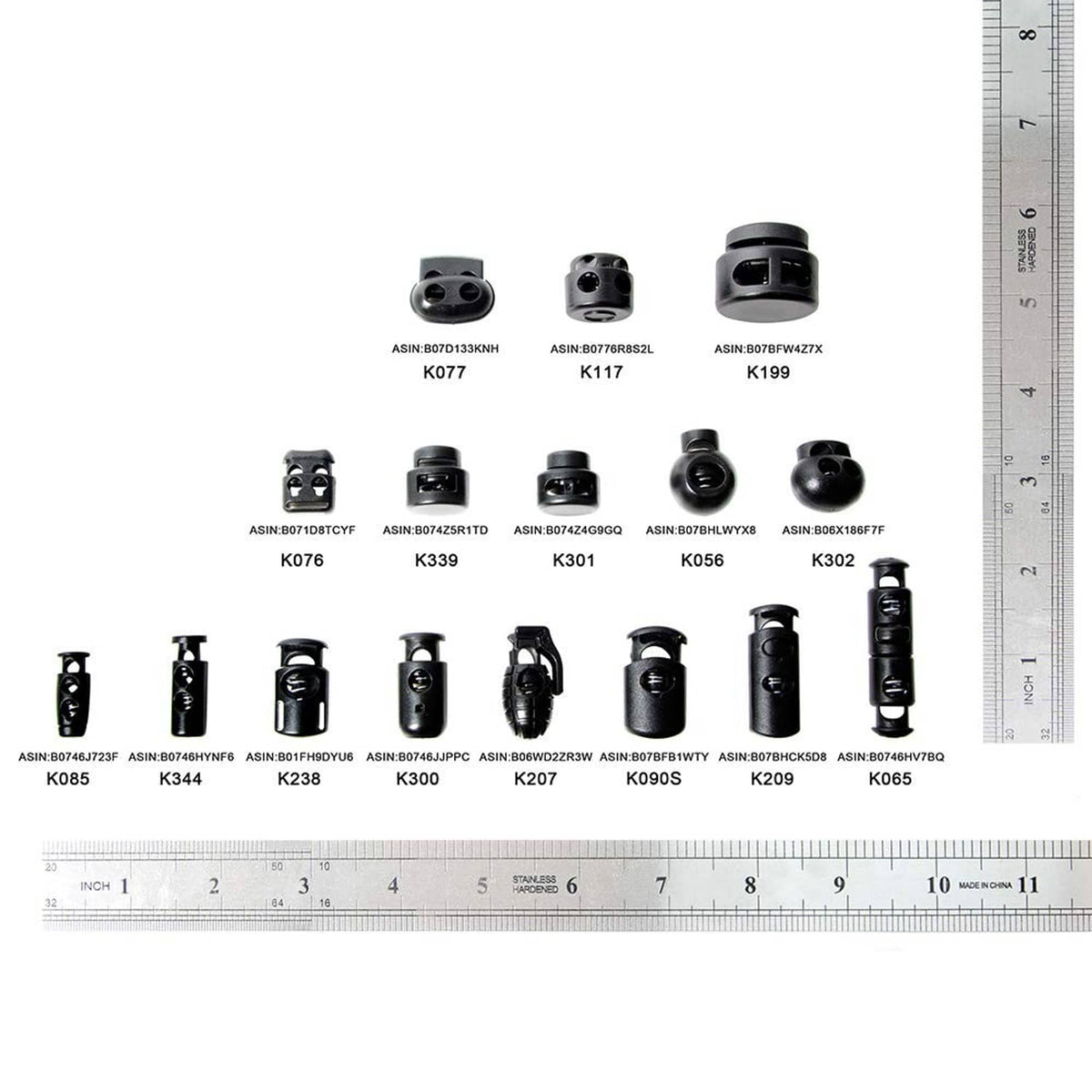 Assorted black cord lock spring stopper ends shown with size ruler
