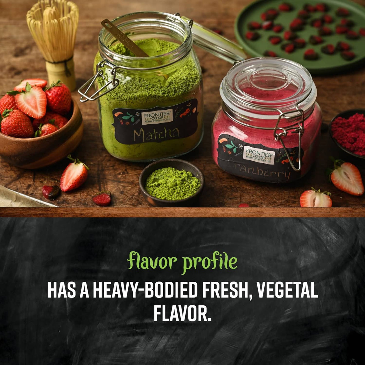 Glass jars of green matcha tea powder with a small bowl of powder