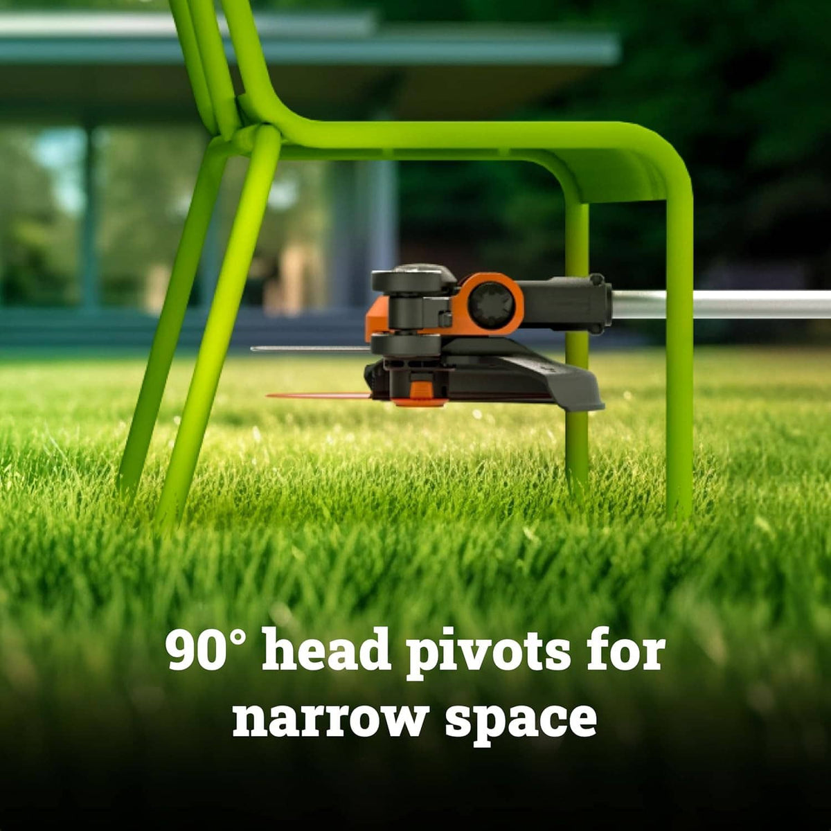 Cordless string trimmer head in low-angle position over grass for edging in tight areas