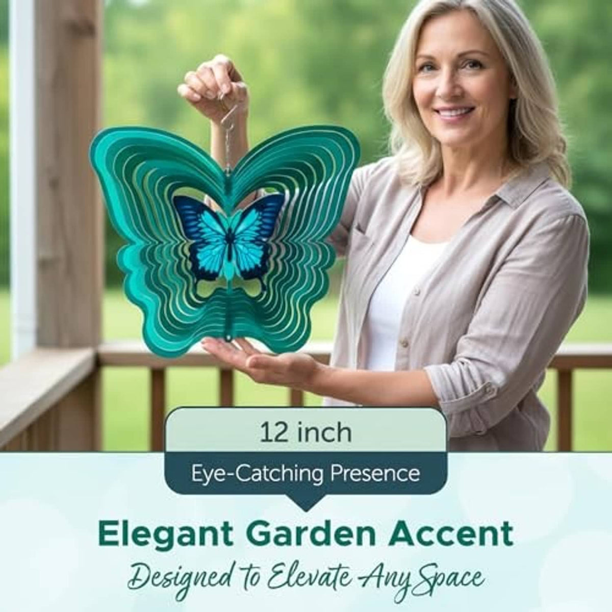 Turquoise butterfly wind spinner held by a woman, showing layered 3D wings