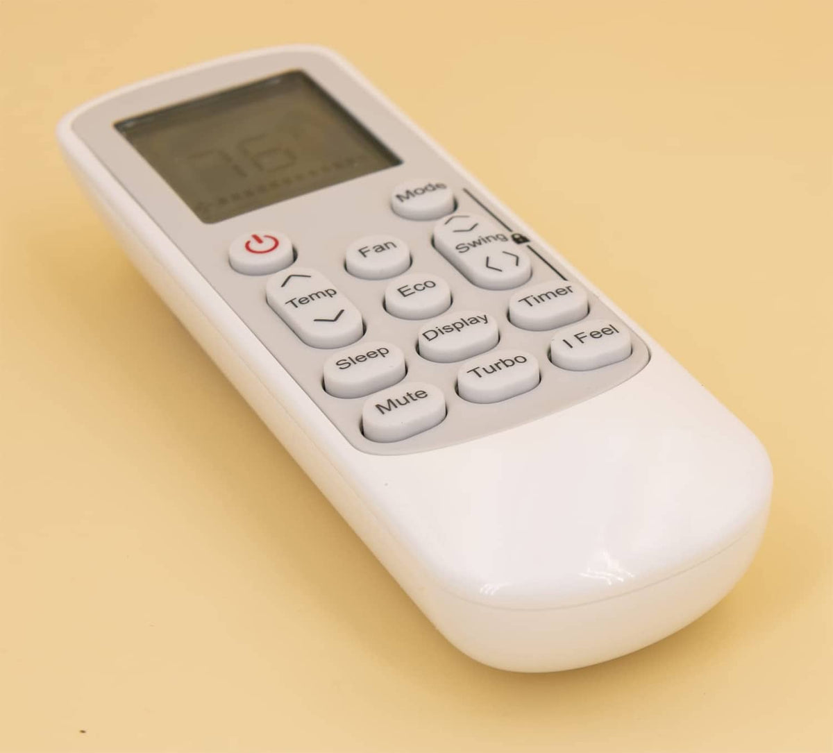 White AC replacement remote control close-up angled view with button layout and LCD screen