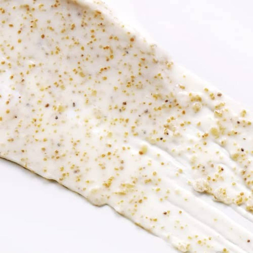 White apricot scrub paste with tiny exfoliating granules