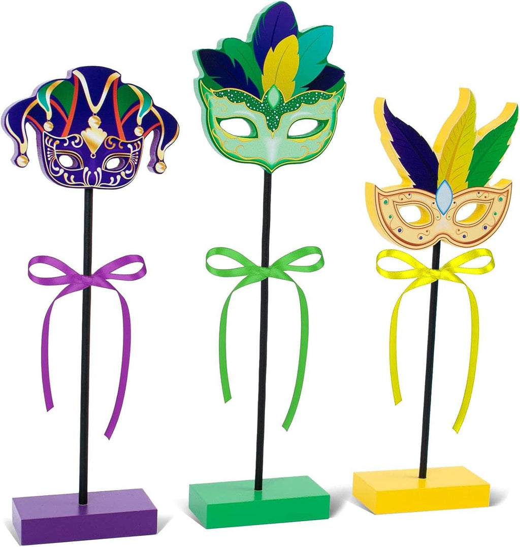Set of 3 wooden Mardi Gras table centerpieces with colorful masks, ribbons, and bases