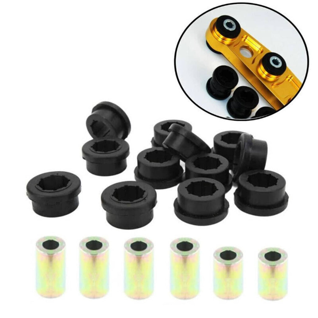 Lower control arm bushing kit with black rubber bushings and yellow-metal detail