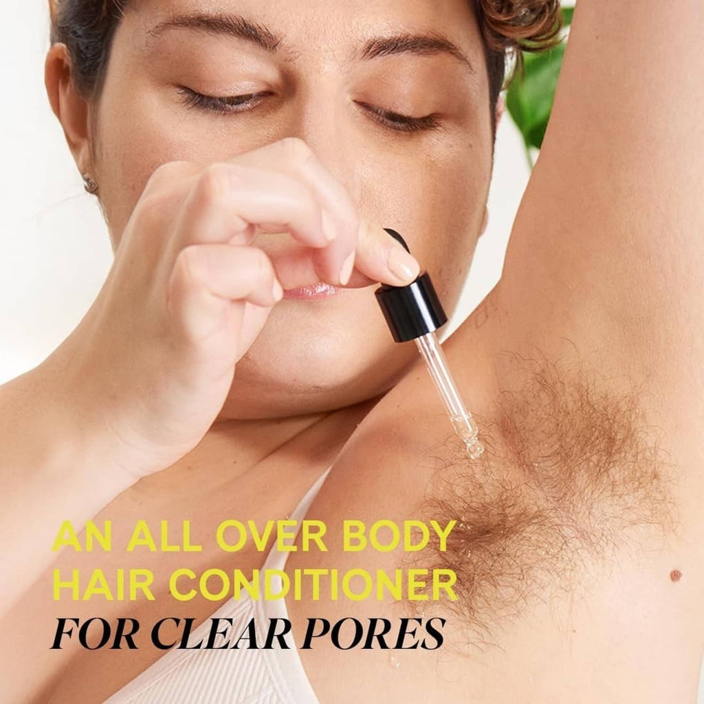 Fur Oil dropper applying clear golden liquid to skin