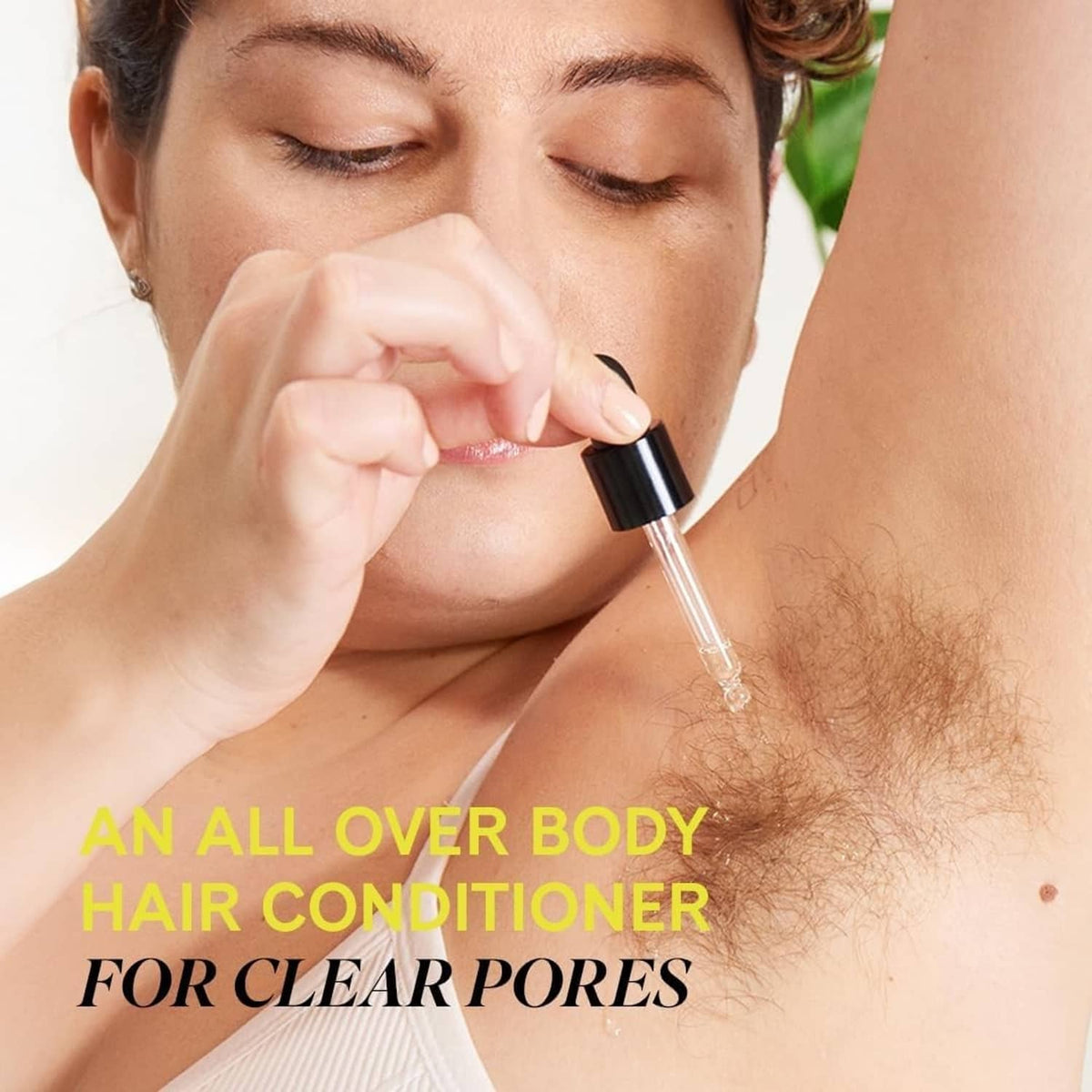 Fur Oil dropper applying clear golden liquid to skin