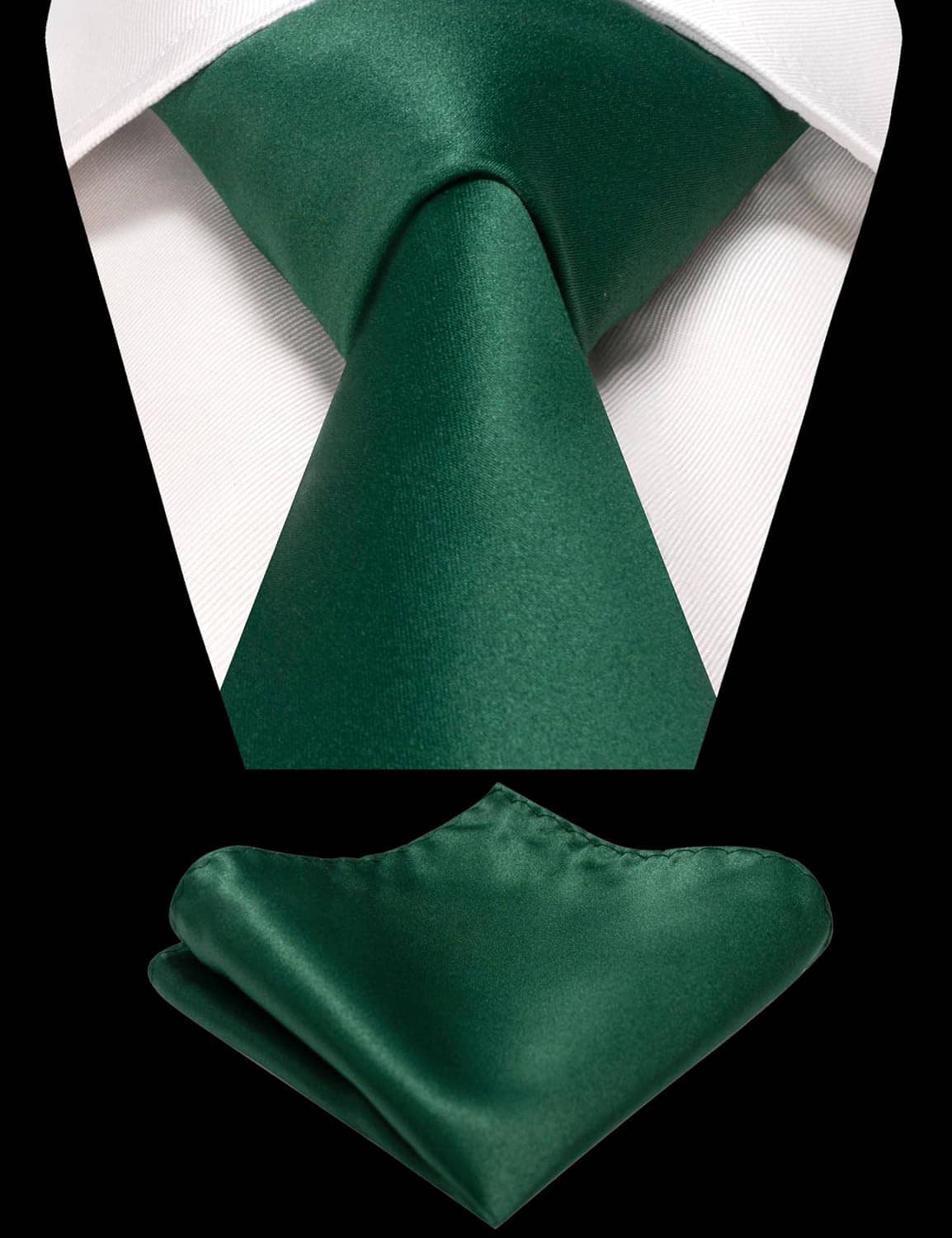 Solid dark green necktie draped with matching pocket square in chest