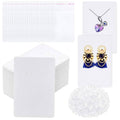 White earring display cards, stud backs, and small self-seal bags in a kit