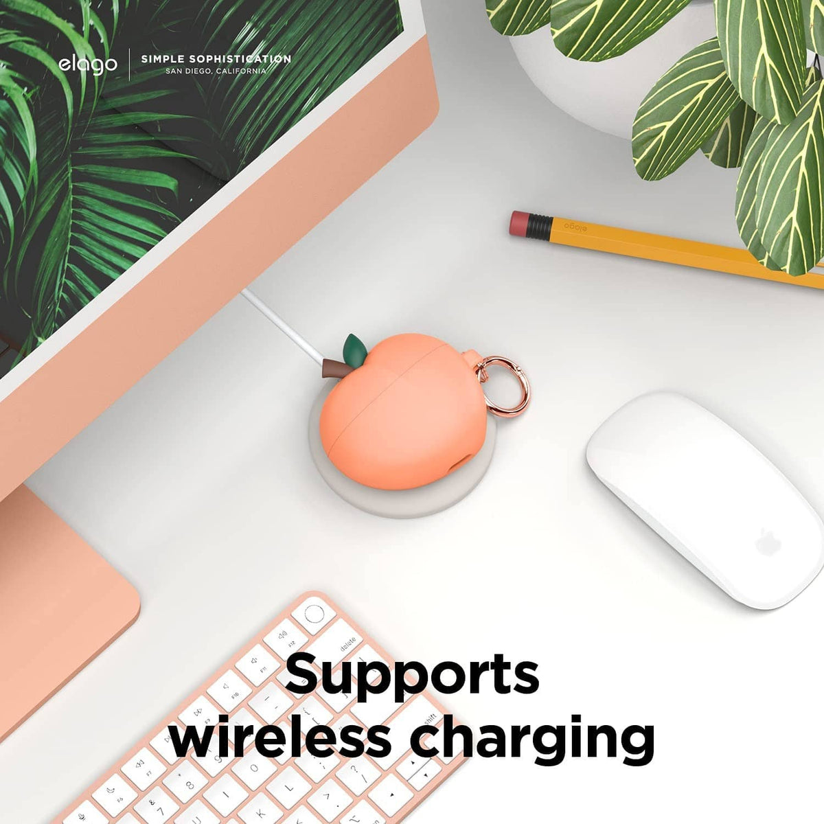Peach silicone charging case cover with green leaf and rose-gold keyring