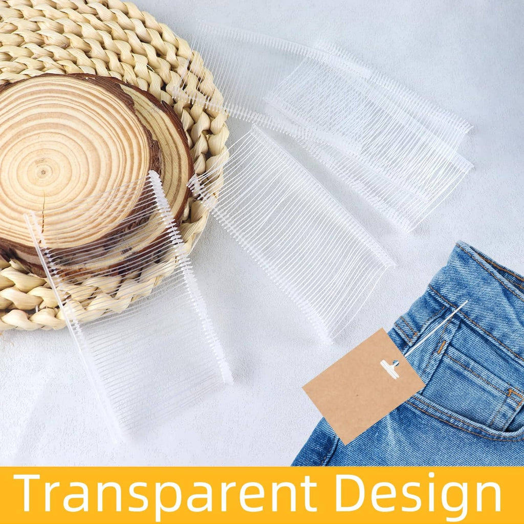 Transparent tag fastener strips with metal prongs for securing clothing tags