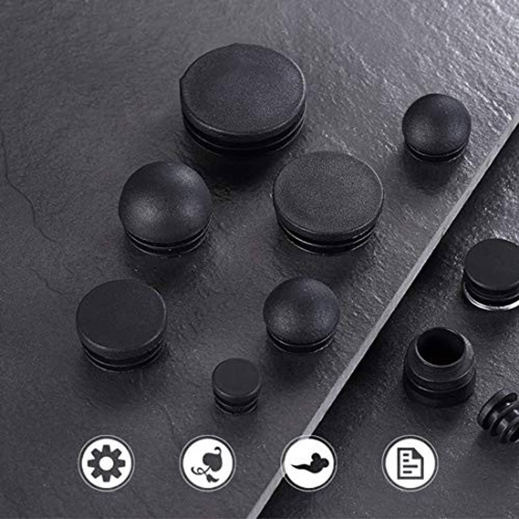 Black round plastic end caps and stacked plugs on slate background, set of 4