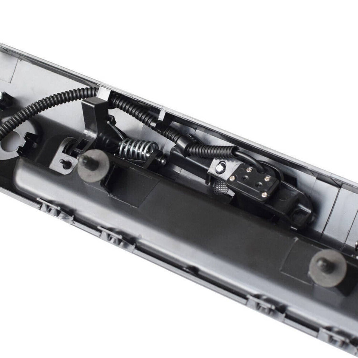 Tailgate handle underside with mounting points and wiring connections