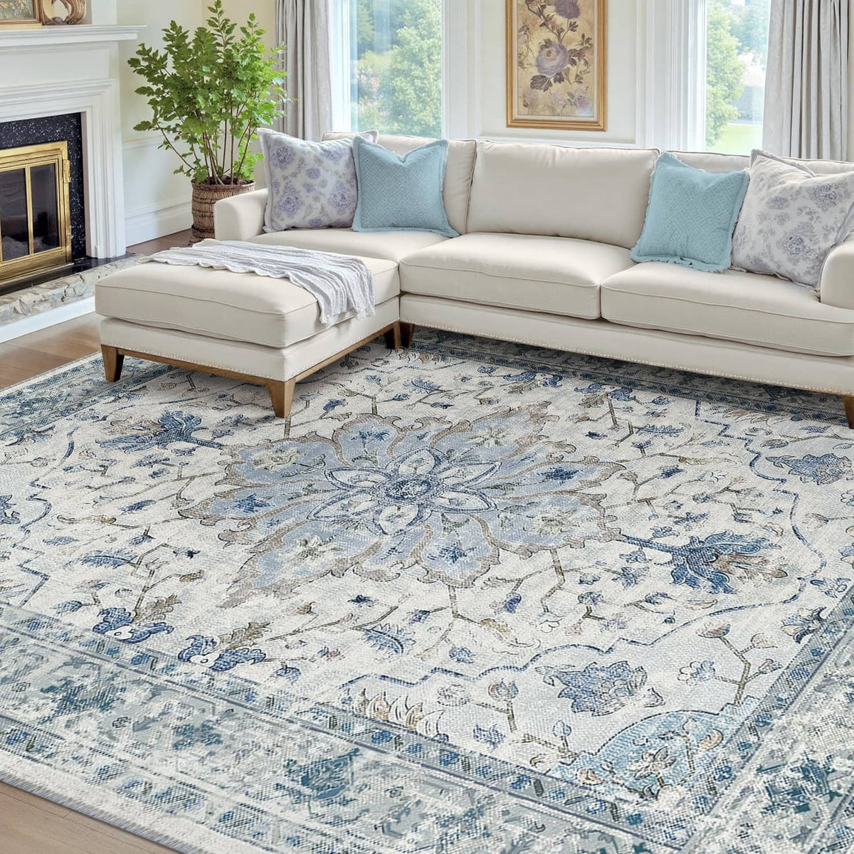 Blue/white/gray area rug with ornate floral pattern and border, rectangular