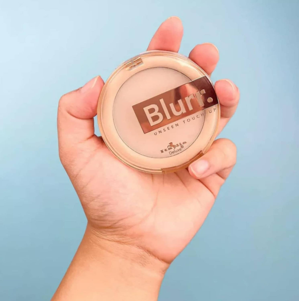 Blurr Unseen Touch Up compact in clear case, sponge pad underneath