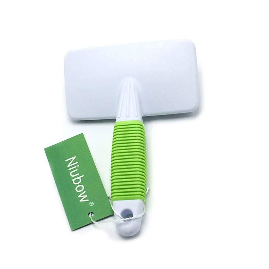 Pet slicker brush with white rectangular pad and green ribbed handle; pins on top.