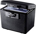 Fireproof document safe in dark textured black with key lock and open drawer holding papers