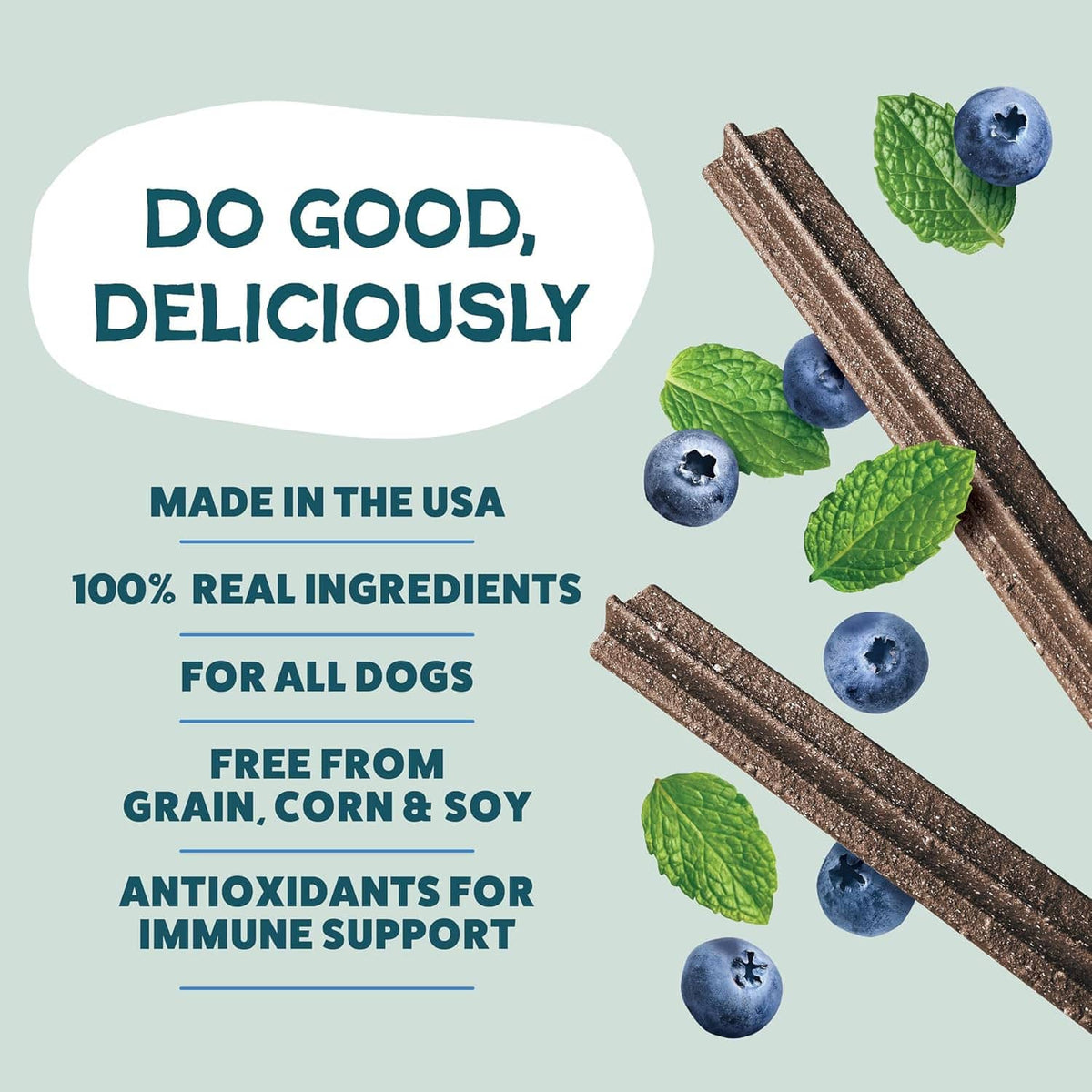 Front of dog dental chew bag with blue text and pictured chew sticks, blueberries, and mint.