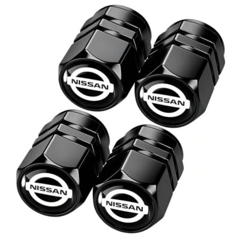 Black metal tire valve stem caps set with Nissan logo, faceted hex design (4-pack)