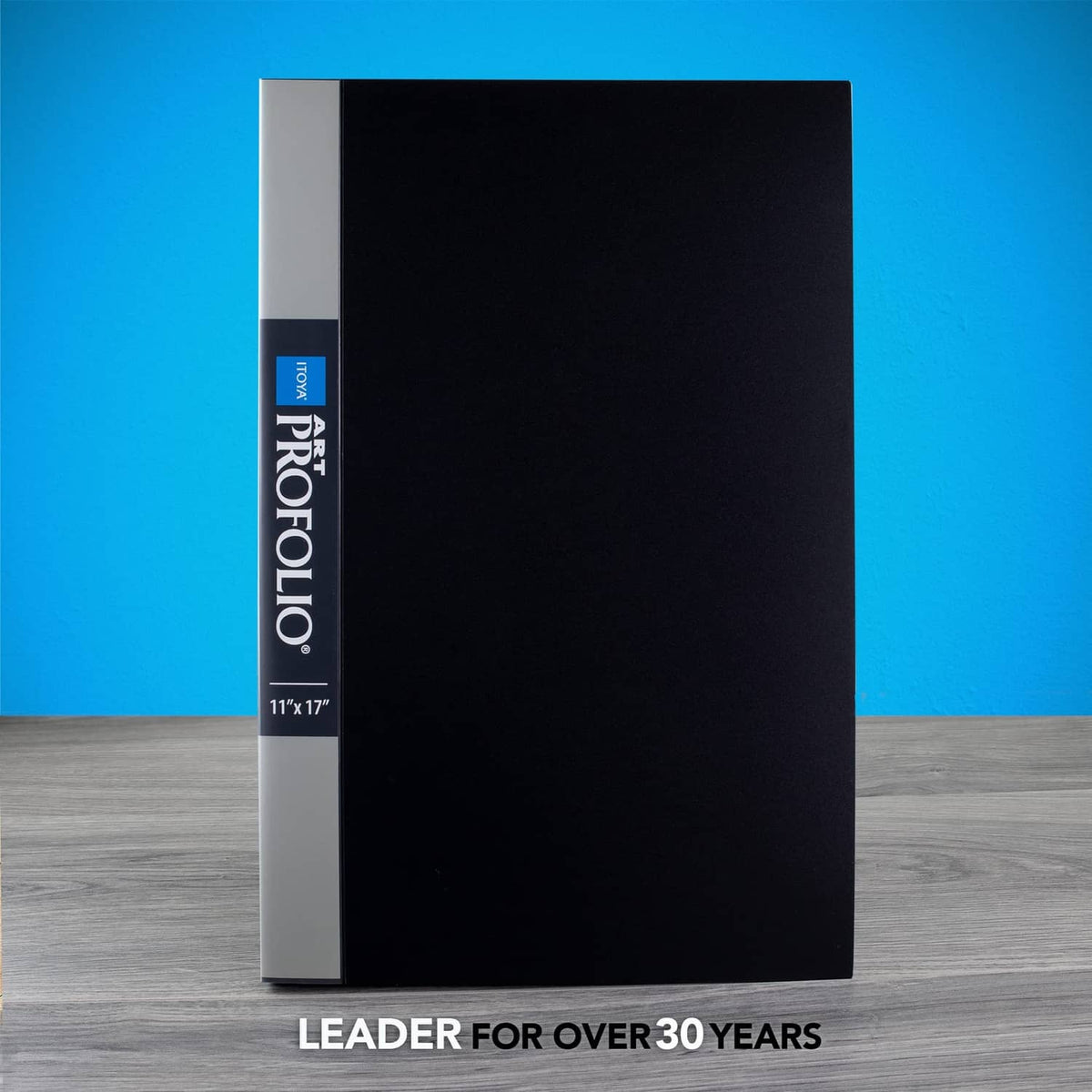 Itoya art portfolio with black cover and white spine, standing view