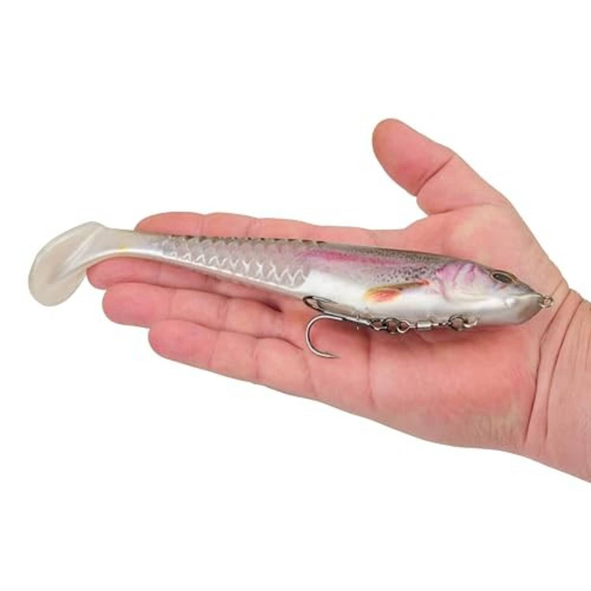 Rainbow trout soft plastic swim bait held in hand, showing treble hook and realistic markings