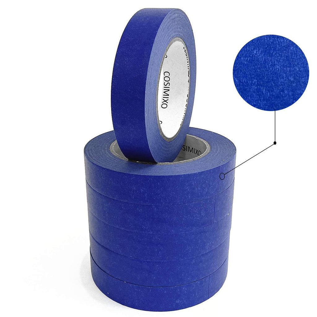 Stacked blue tape rolls with a spare roll leaning upright.