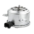 Radiator fan cooling motor with silver metal housing and black electrical connector