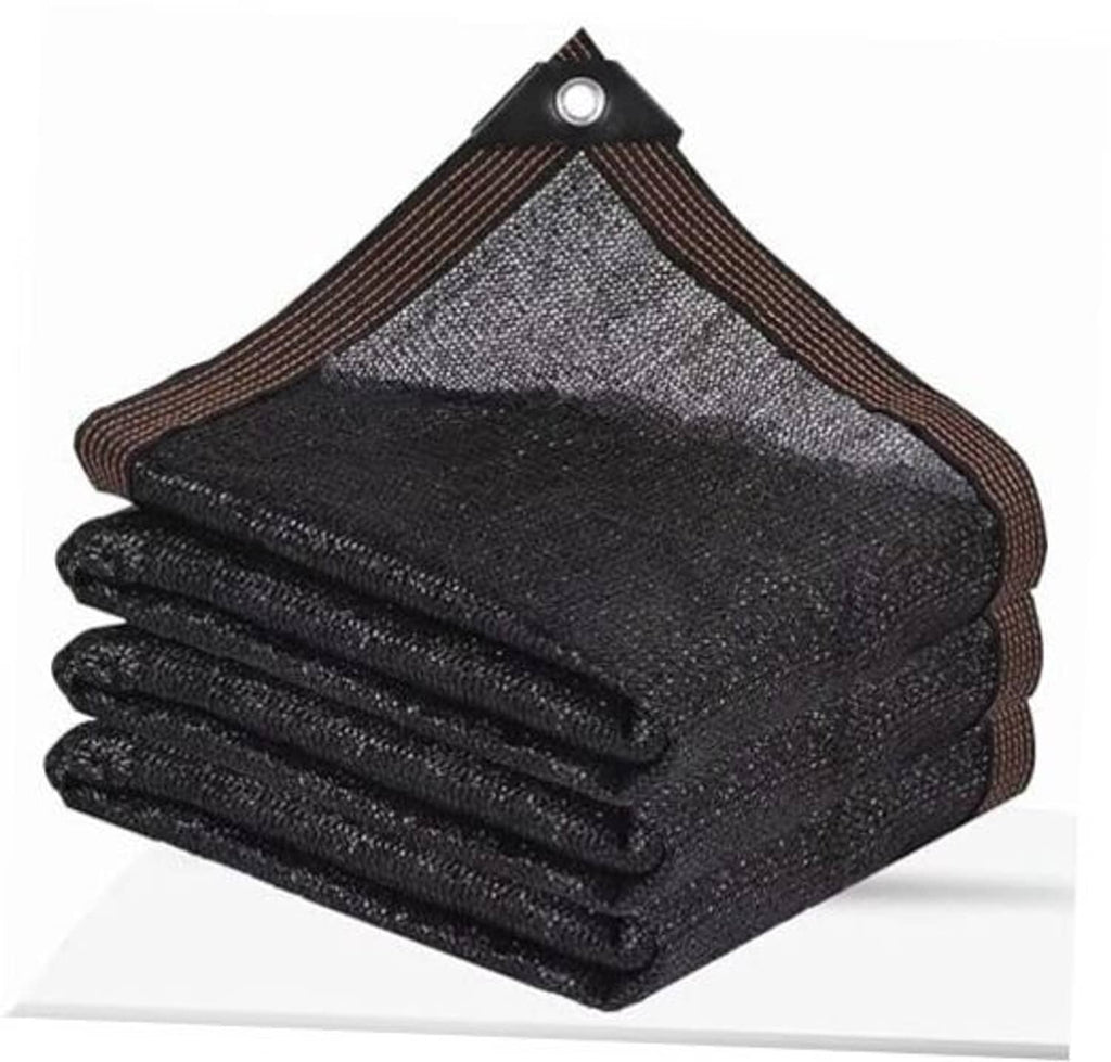 Stacked black shade netting panels with brown binding and top grommet corner tabs