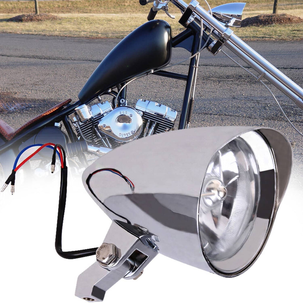Tri-bar chrome bullet headlight with clear lens and mounting bracket on motorcycle front
